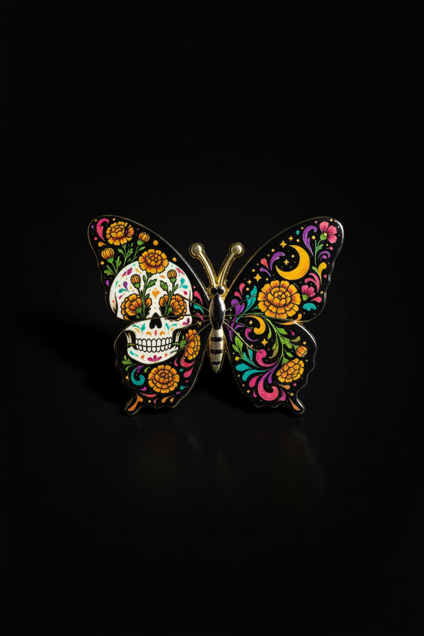 Black butterfly pin with Day of the Dead sugar skull and marigold florals